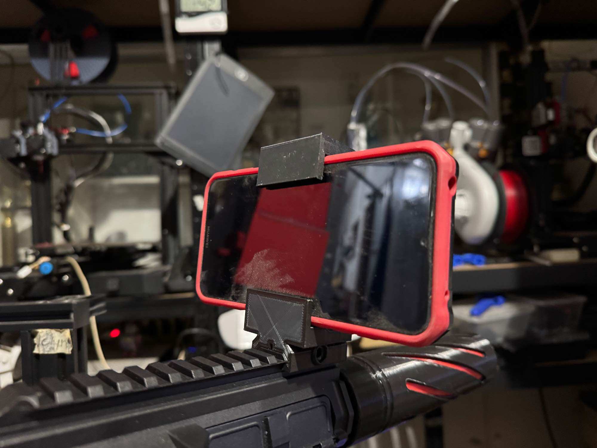 jomarx 3d printed cell phone holder for gel blasters / softair